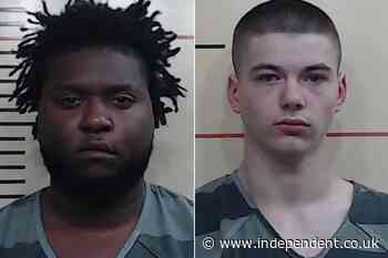 Two arrested for ‘shooting dead a married couple and another man’ during a robbery