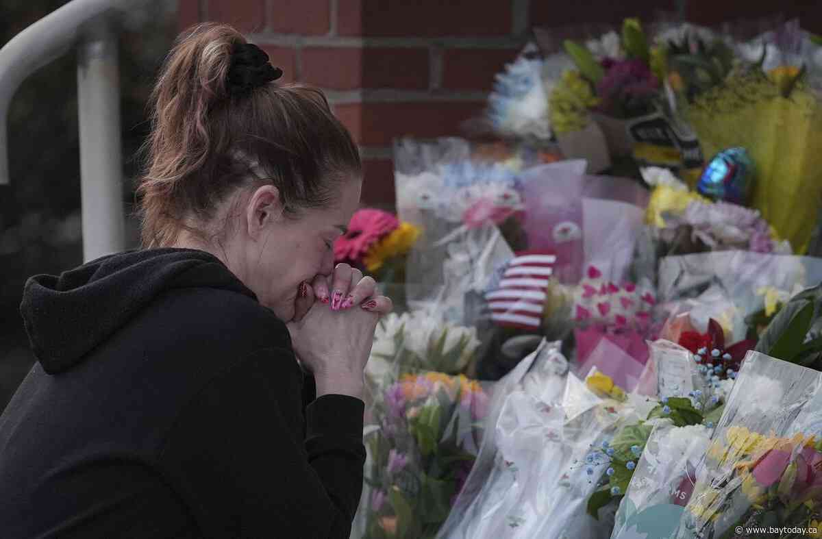 Prosecutor says officer killed in gunman's Pennsylvania hospital siege was hit by police fire