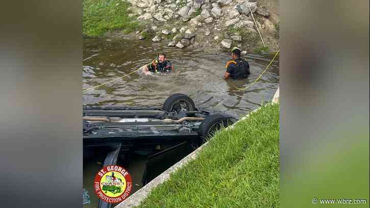 Car runs into pond at Highland and Pecue intersection; driver not found