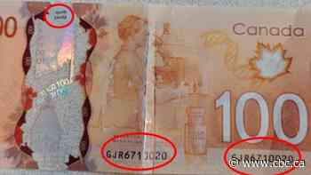 Winnipeg police warn of counterfeit cash marked 'prop money' after $12K seized
