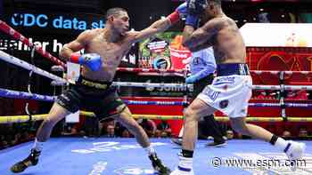 Lopez tops Barboza in Times Square to retain belt