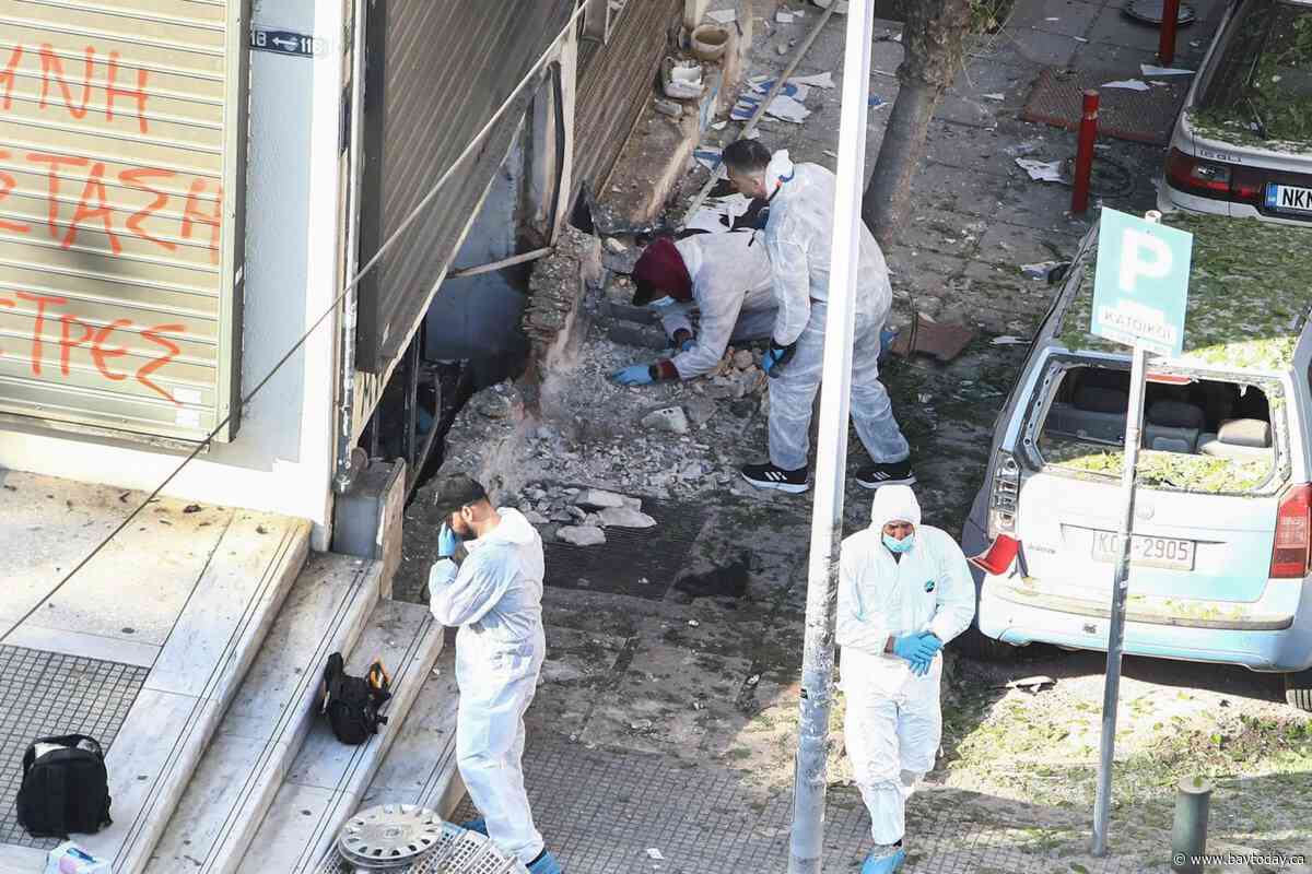 Woman dies when a bomb she is carrying explodes in the Greek city of Thessaloniki, police say