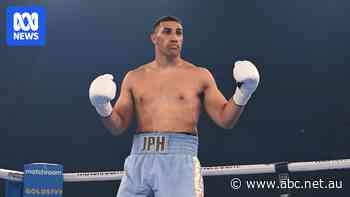 Justis Huni steps up to fight for interim heavyweight world championship