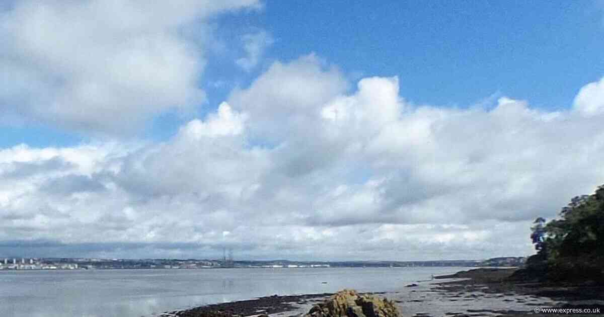 Woman's body found on beach as police lock down beauty spot