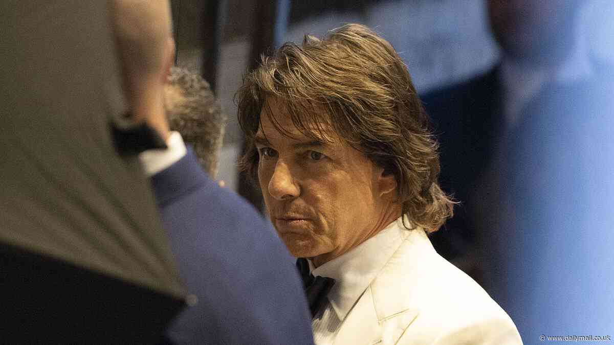 Tom Cruise makes a low-key arrival at David Beckham's 50th birthday bash as he appears to arrive solo despite 'planning on going with rumoured girlfriend Ana De Armas'