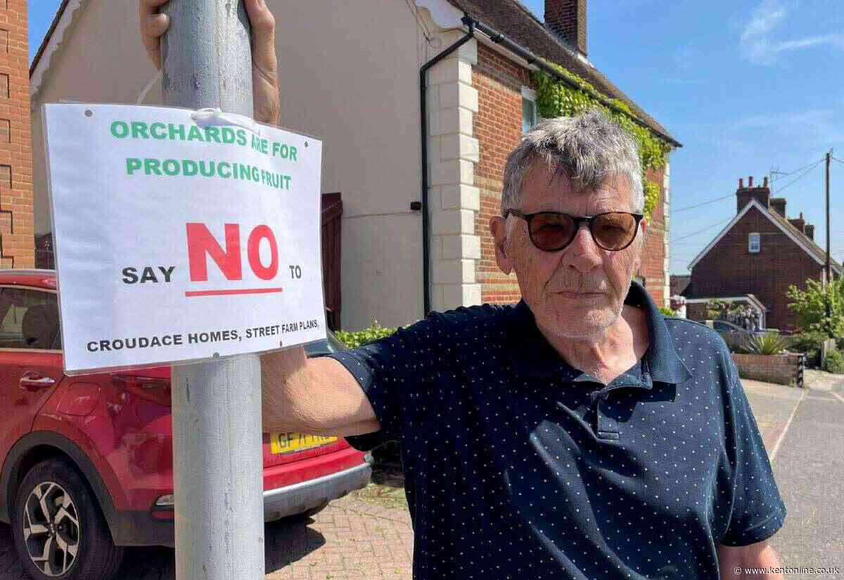 Villagers rally against 100-home plan for orchard