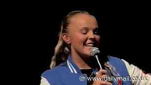 JoJo Siwa teases future with Chris Hughes as she fails to shut down romance rumours and admits she wants him in her life for a 'very long time' after his Celebs Go Dating U-turn
