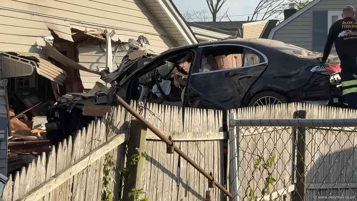 Wild moment speeding Mercedes crashes into Long Island home