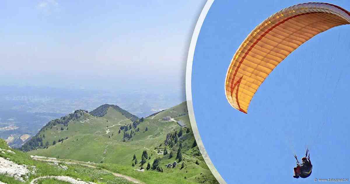 Reddingsactie voor Nederlandse paraglider (72) in Italië: hangt 12 meter boven zeeniveau