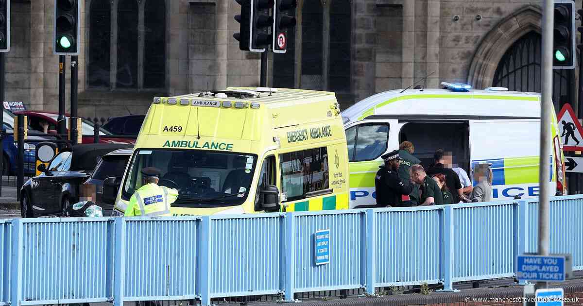 Woman dies and man arrested on suspicion of murder after car ploughs into multiple pedestrians in Rochdale