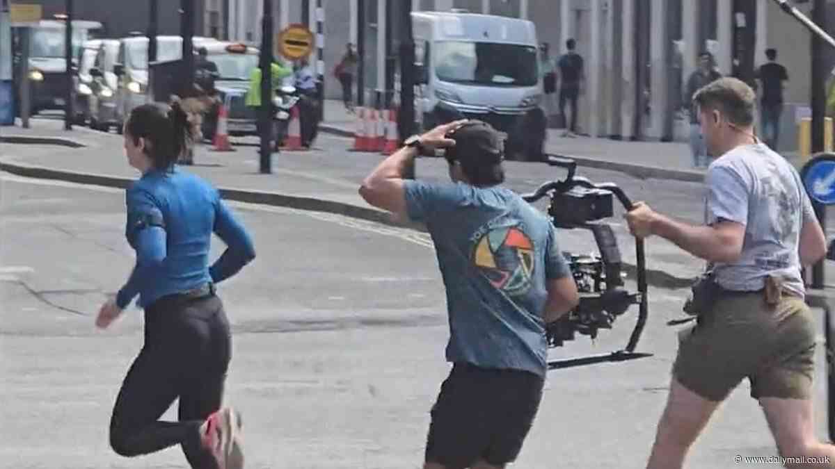 Hollywood actress sprints across a road in east London during filming for her latest movie - but can you guess who is it?
