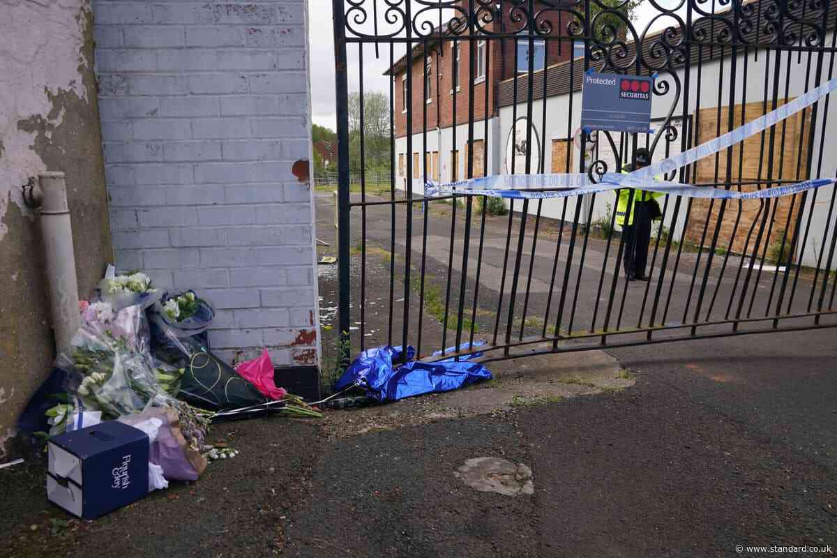 Tribute paid to boy who died in fire as 14 children arrested