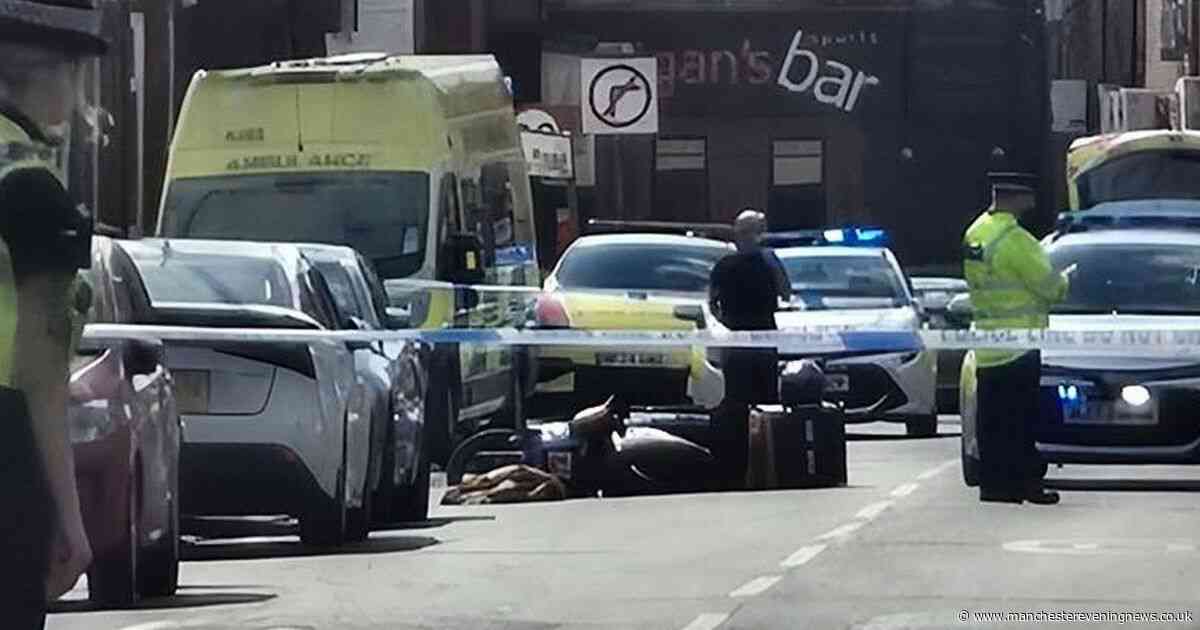 Delivery driver stabbed in horrific machete attack by group before south Manchester street cordoned off
