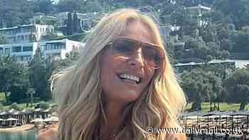 Tess Daly, 56, flaunts her abs in a tiny bikini while partying with her pals on board a luxury yacht during girls' holiday