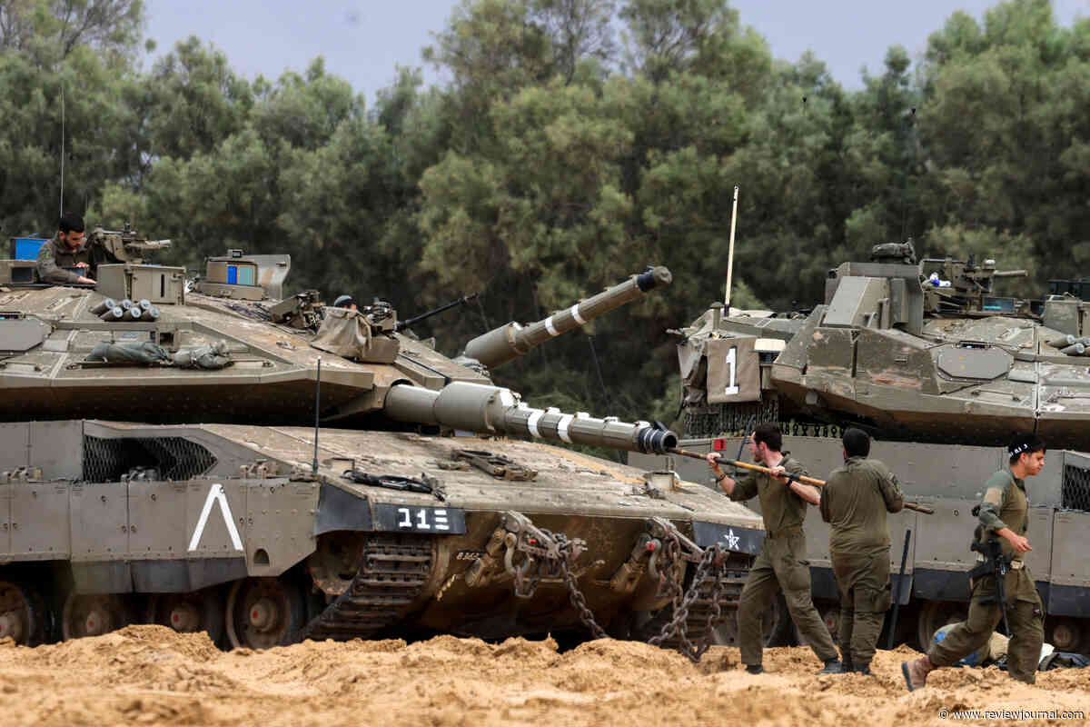 Israel vows to step up Gaza fighting, set to hold more territory