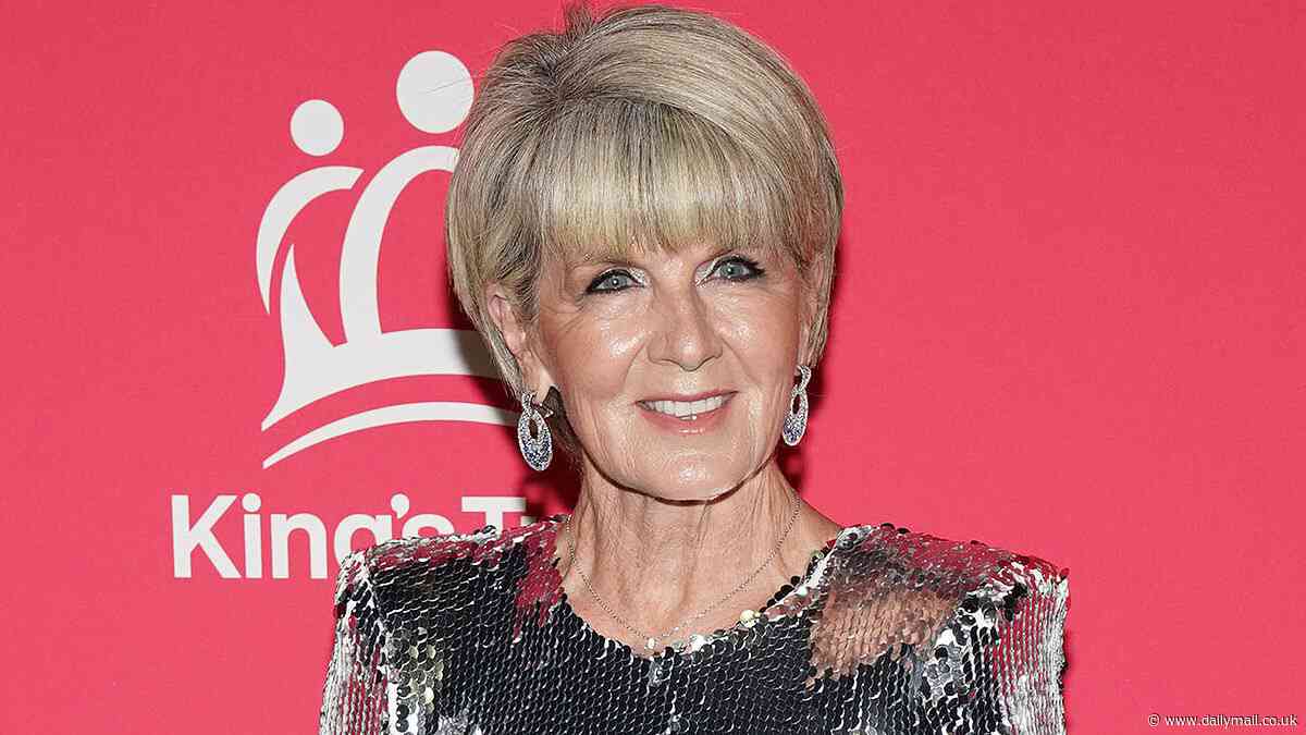 Move over Met Gala! Julie Bishop outshines A-listers in NYC as she stuns in a silver gown while holding hands with boyfriend Stephen Gray