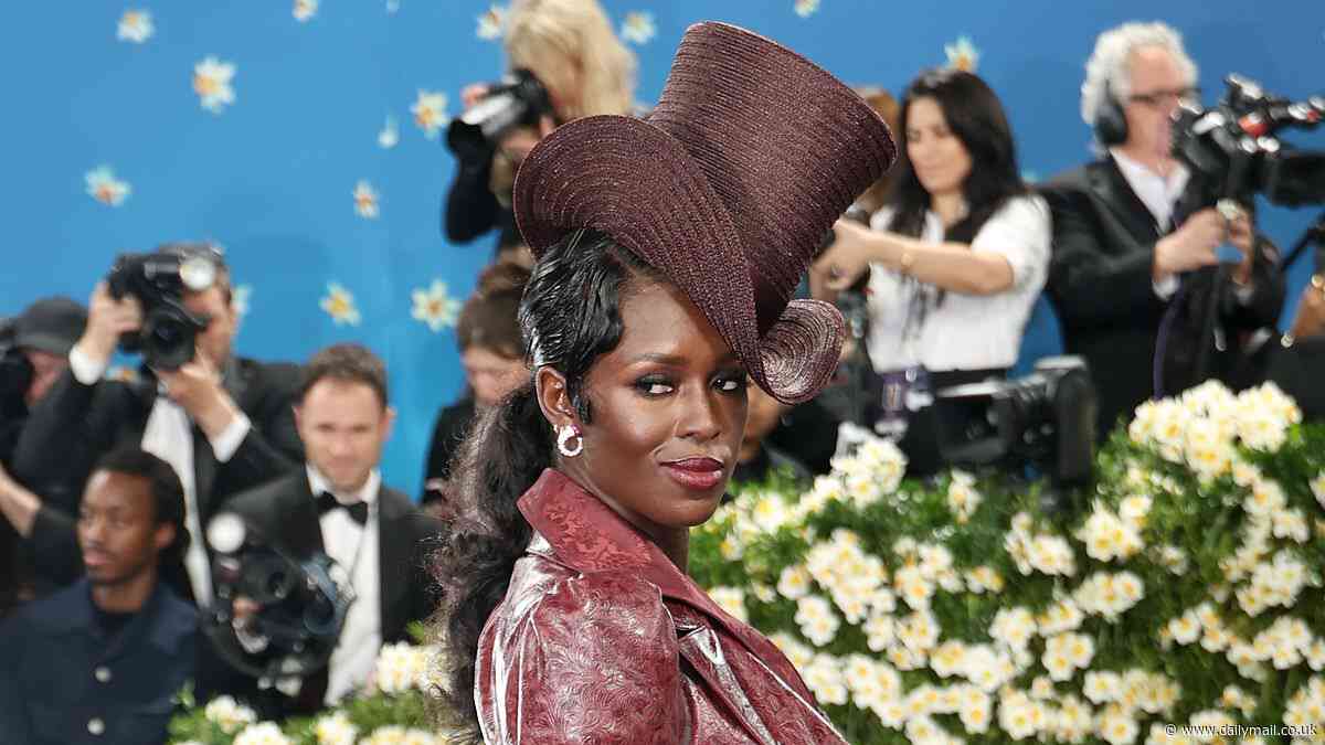 Jodie Turner-Smith stuns at the Met Gala in red leather dress and a statement top hat