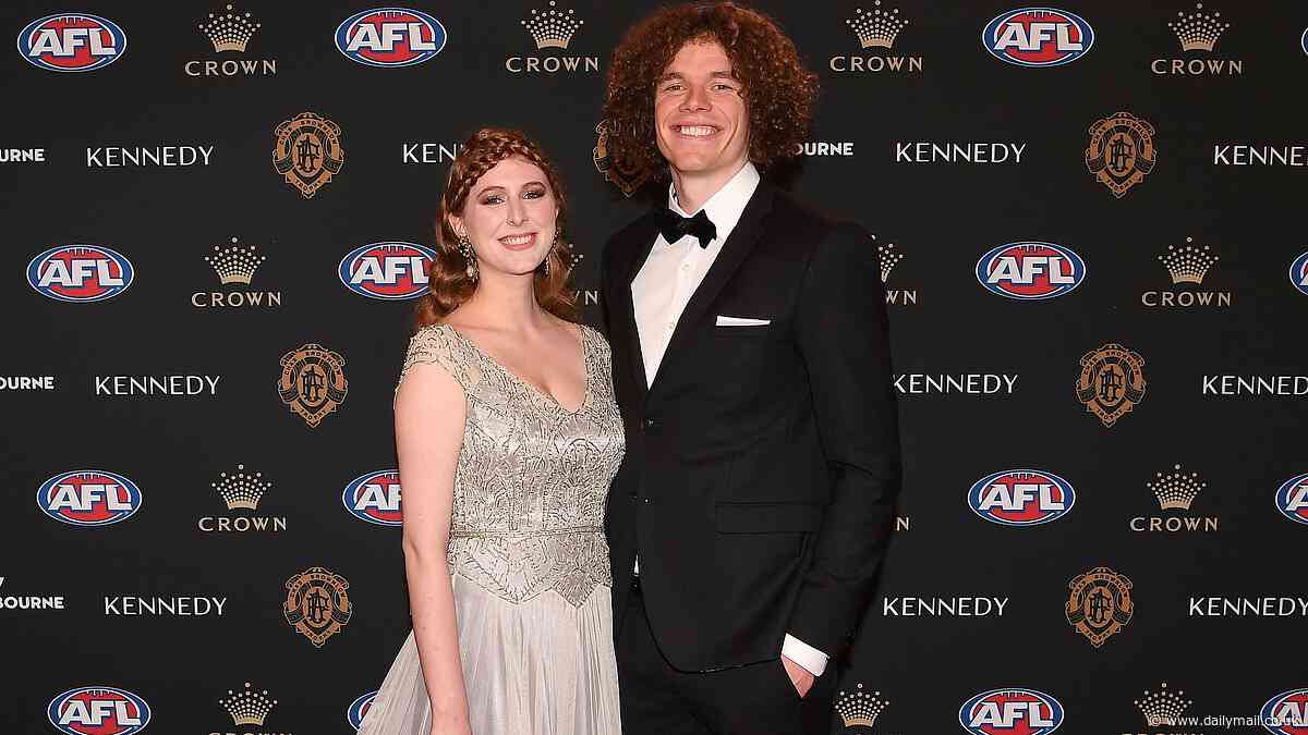 Footy great Ben Brown launches into tear-jerking defence of his wife after she was bullied over her looks on TV