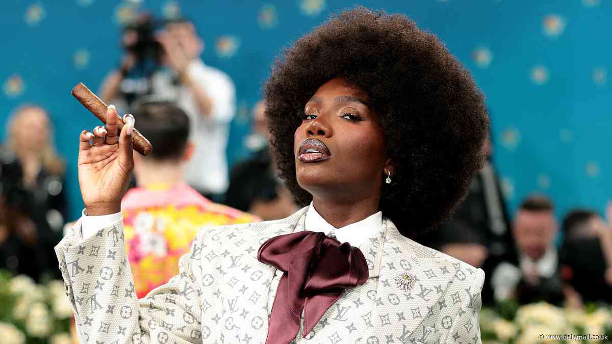 Doechii arrives at the Met Gala in a BOX before puffing on a cigar on the red carpet as she makes her iconic debut at the star-studded event