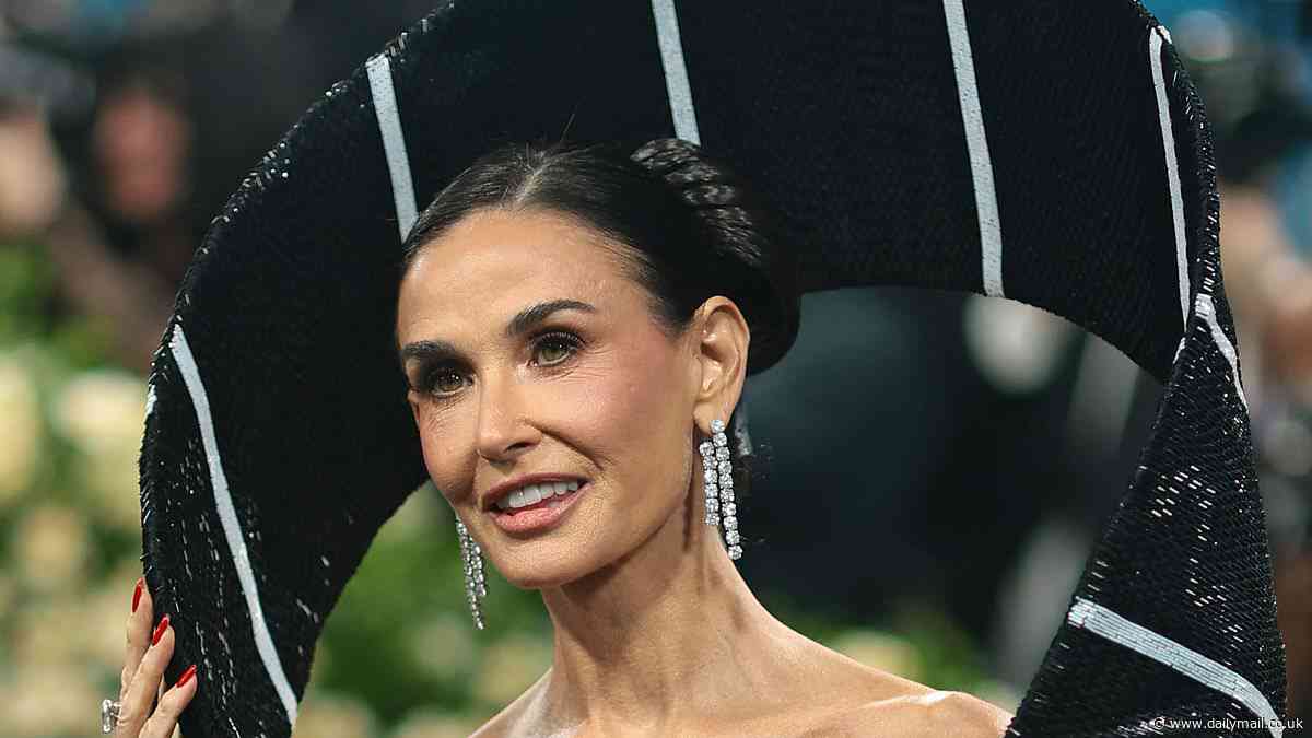 Demi Moore's optical illusion dress with 'neck tie halo' divides opinions as star misses the mark at the Met Gala