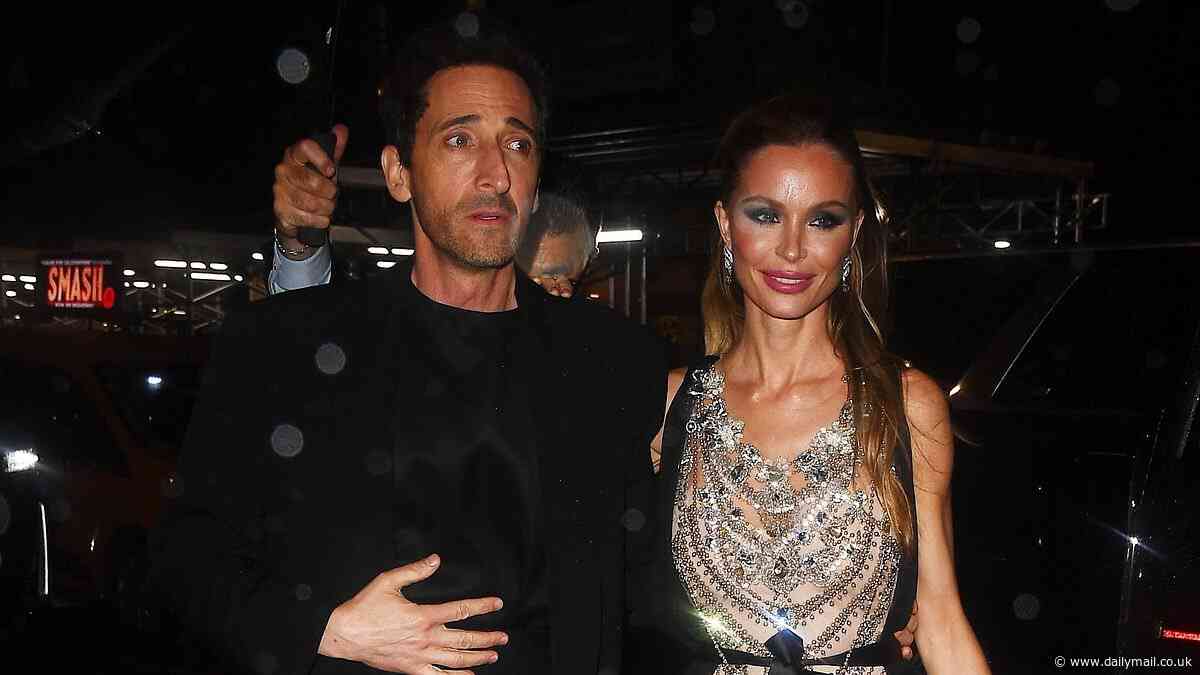 Adrien Brody puts on a loved-up display with stylish girlfriend Georgina Chapman as they attend A$AP Rocky's Met Gala afterparty