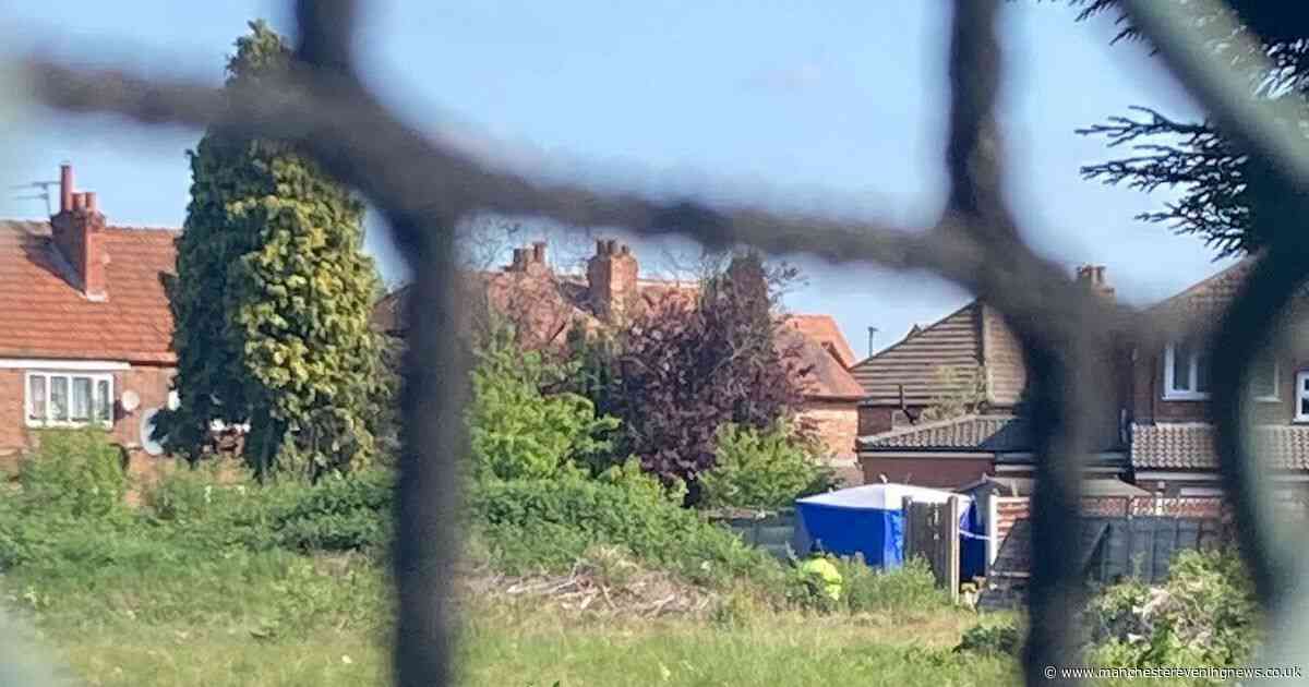 Greater Manchester Police comb site of former cricket club after a woman's body is found