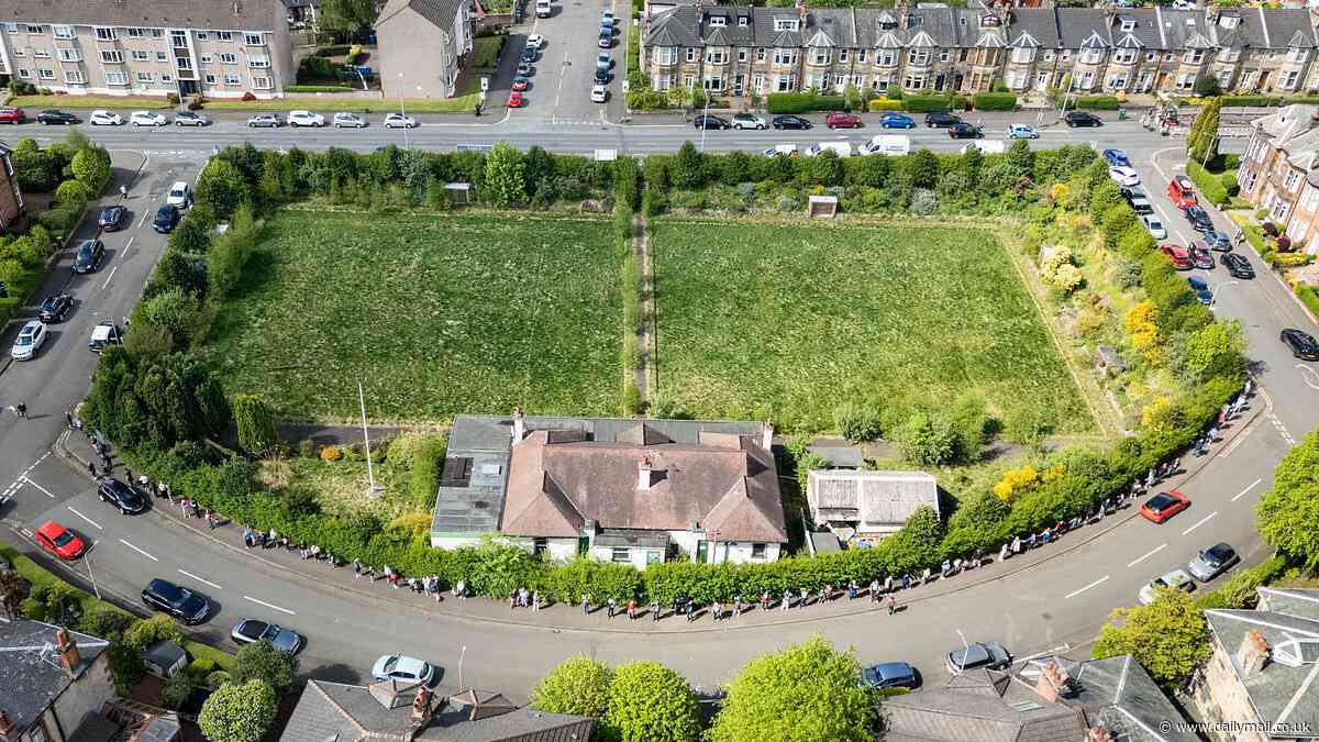 More than 100 residents form human chain to 'hug' bowling green in bid to protect the 'only green space' from developers