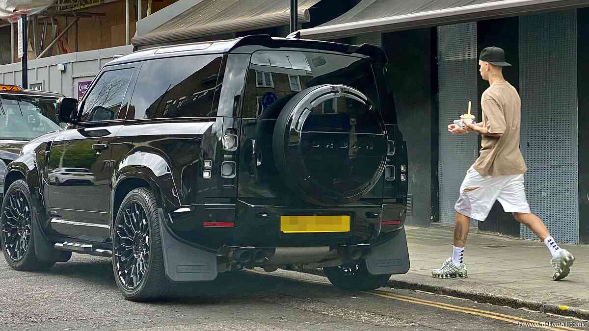 Romeo Beckham wins an unwanted penalty after parking his £200,000 Land Rover on a double yellow - as 'feud' with older brother Brooklyn continues