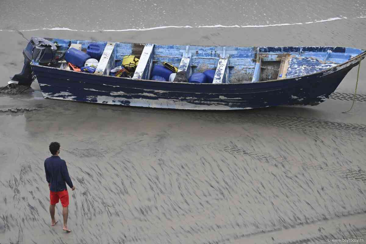 5 people charged after migrant boat capsized, killing 3, including 14-year-old boy from India