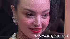 Cute moment Miranda Kerr facetimes her kids just before she steps onto the red carpet at the Met Gala in NYC
