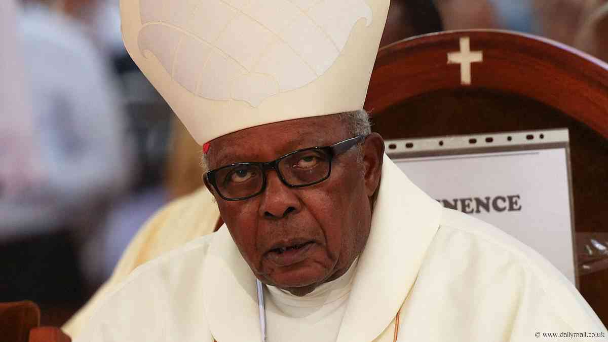 Conclave mystery as African cardinal claims he 'hasn't been invited' to join voting for new Pope - while Vatican insists his non-attendance is due to 'poor health'