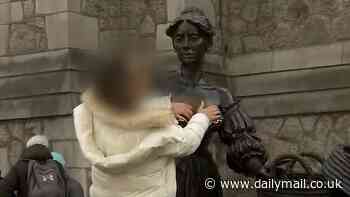 Dublin council calls in guards to stop tourists touching breasts of Molly Malone's statue after claims the good-luck gesture is damaging her assets