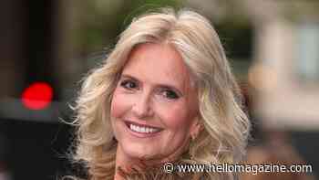 Penny Lancaster shimmers in body-gliding dress alongside towering model son Alastair 