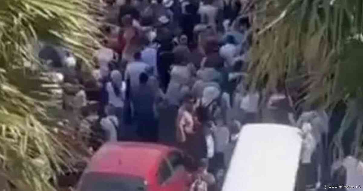 Town overrun by 75,000 tourists sparking 'gridlock' as sightseers wait 'hours'