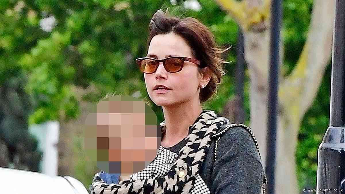 Jenna Coleman looks every inch the doting mother as she takes her baby for afternoon stroll