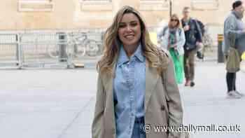 Dannii Minogue, 53, cuts a youthful figure in double denim as she leaves BBC studios in London