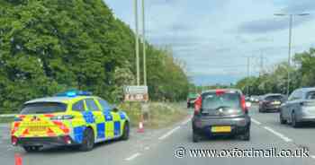 Rush hour road closure caused by abandoned caravan