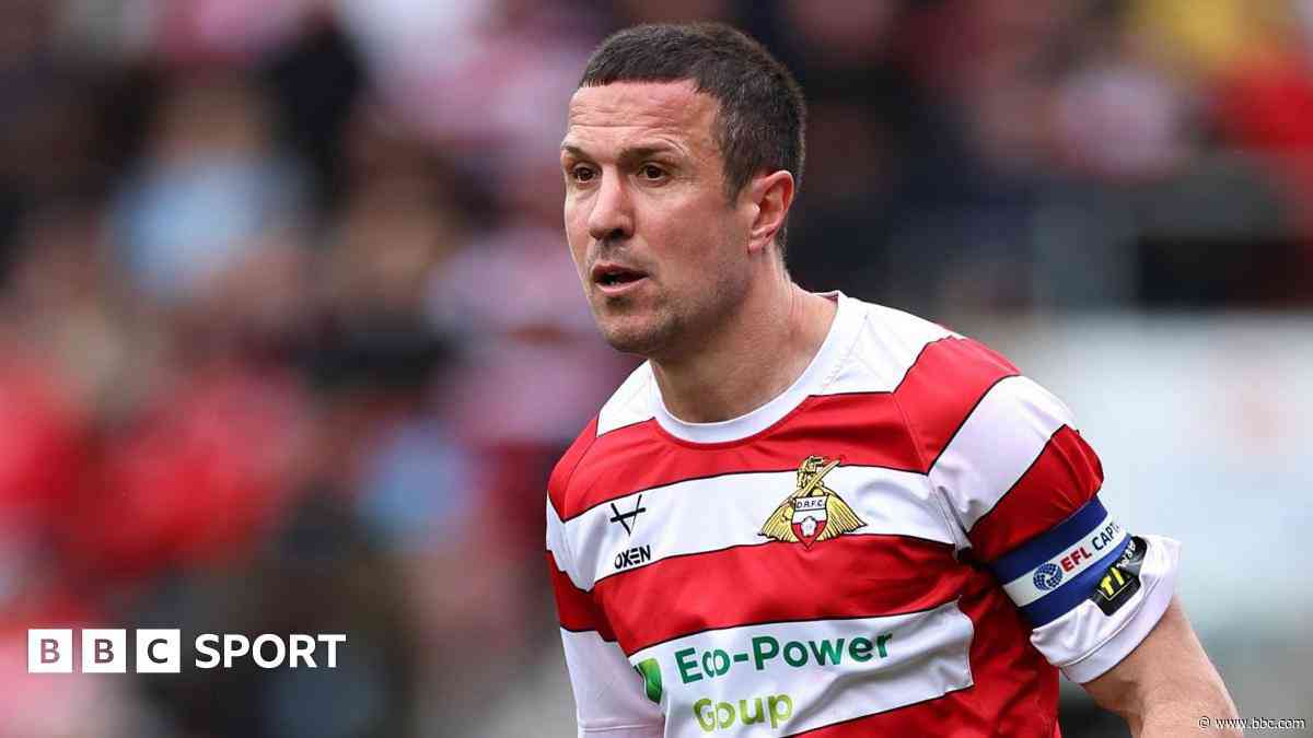 Defender Wood retires after Doncaster promotion