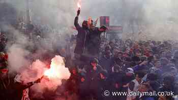 Paris Saint-Germain fans 'teargassed in clash with riot police' in the French capital ahead of crunch Champions League tie with Arsenal