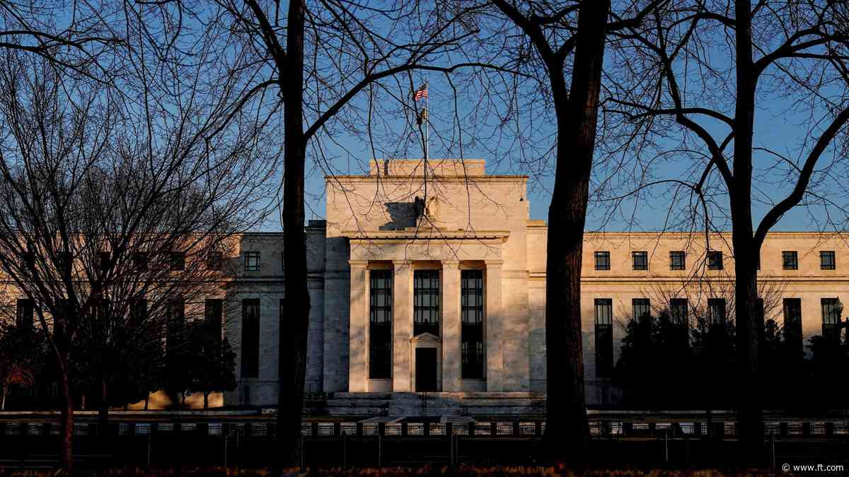 Federal Reserve holds rates steady as it warns of rising economic risks