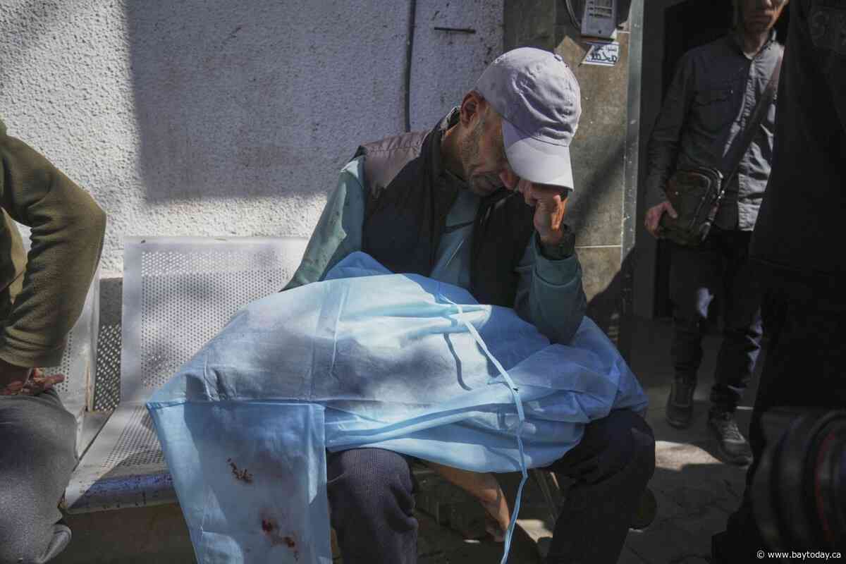 Strikes across Gaza kill at least 92 as Israel prepares to ramp up its offensive