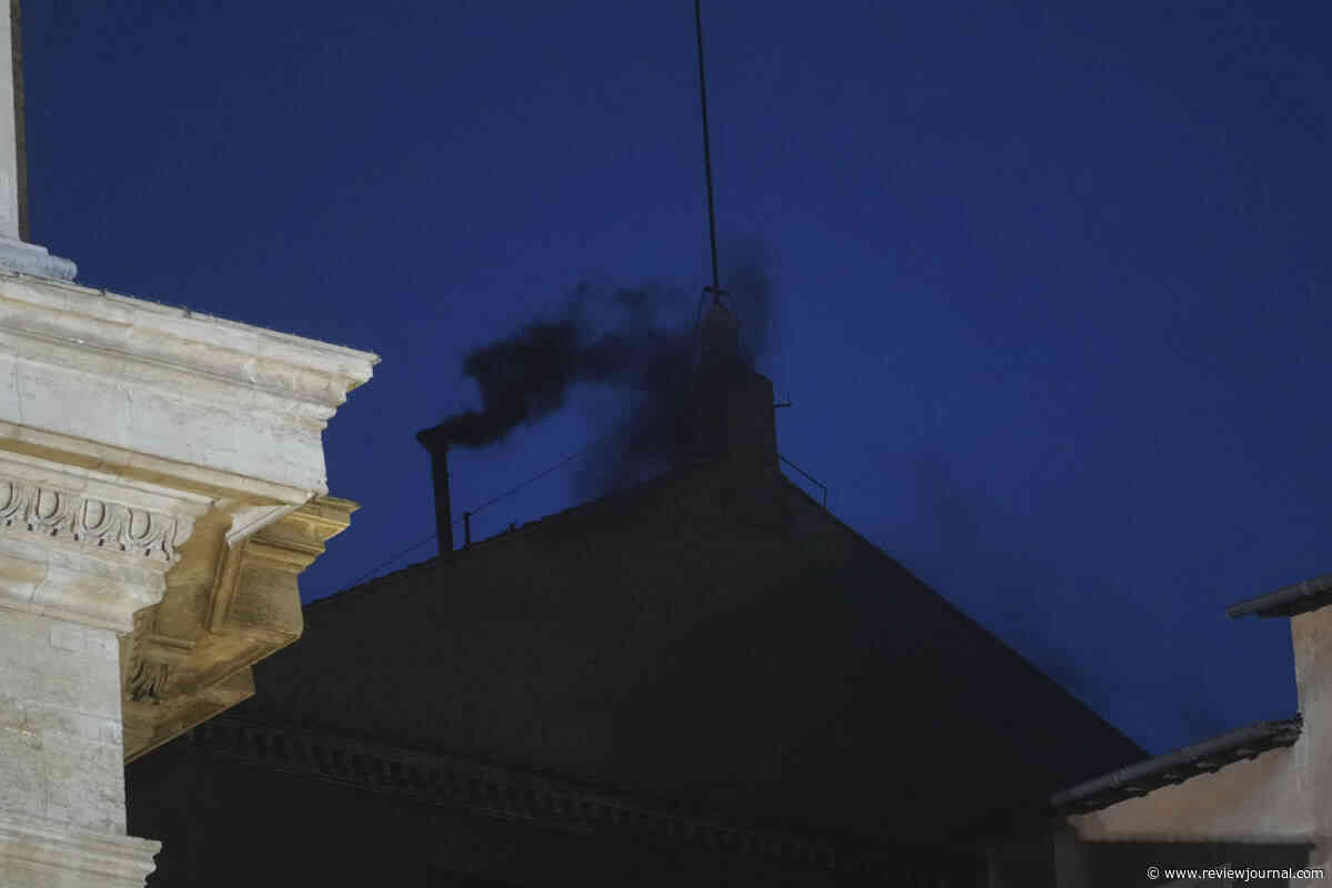 Black smoke pours from Sistine Chapel chimney, indicating no pope was elected as conclave opens