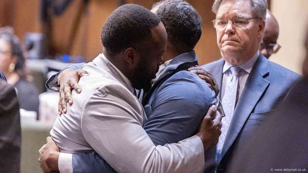 Three cops hug and cry as they're CLEARED in death of Tyre Nichols