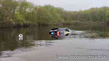 Wolcott police officer rescued from sinking cruiser