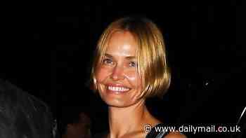 Lara Worthington dons a sheer corset over a white nightdress as she arrives at a Met Gala afterparty in New York City