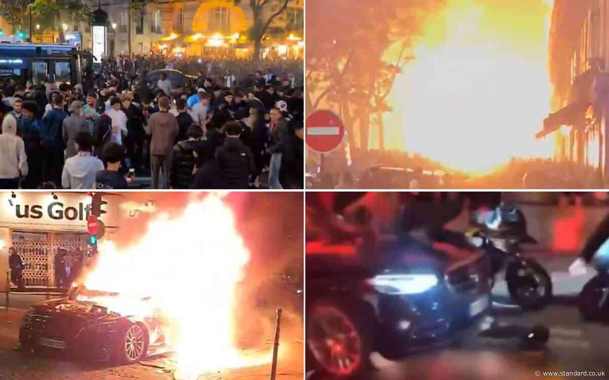 Violence erupts in Paris as car drives over fans and is set alight after PSG vs Arsenal game