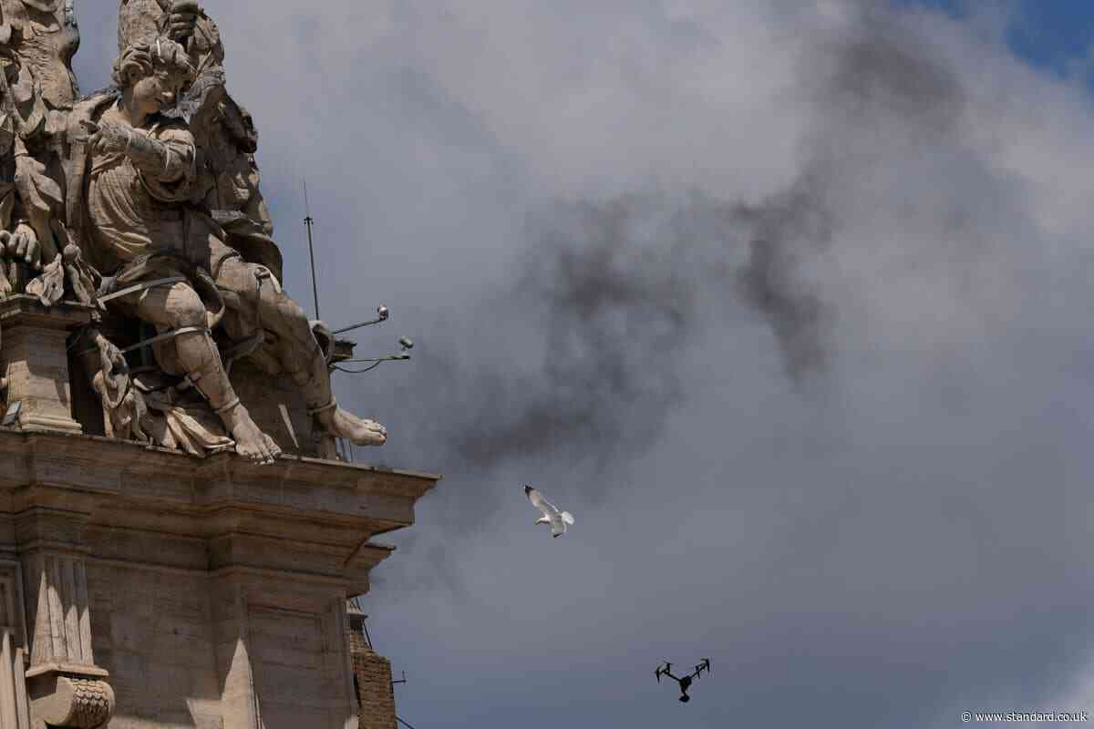 More black smoke from Sistine Chapel signals wait for new pope goes on