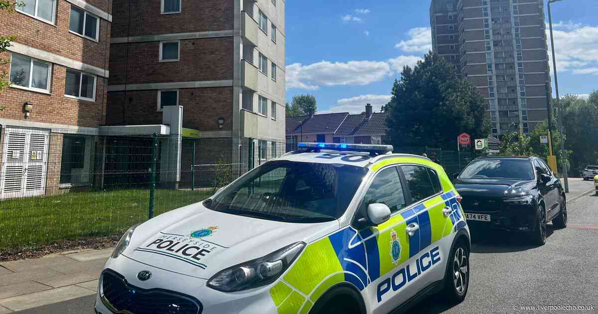 Kirkby police incident live as block of flats cordoned off