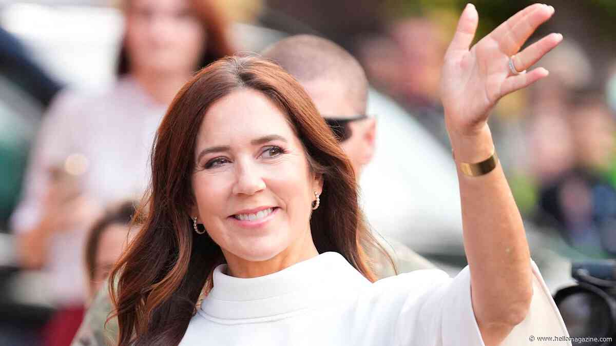 Queen Mary has never looked better in recycled waist-cinching dress