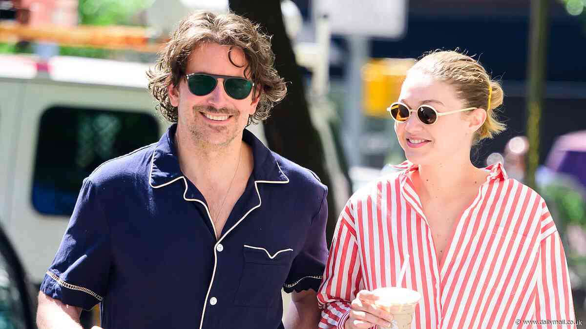Bradley Cooper, 50, smiles during date with girlfriend Gigi Hadid, 30... after kissing for the camera